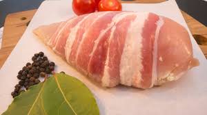 4 Large stuffed chicken fillets wrapped in streaky bacon